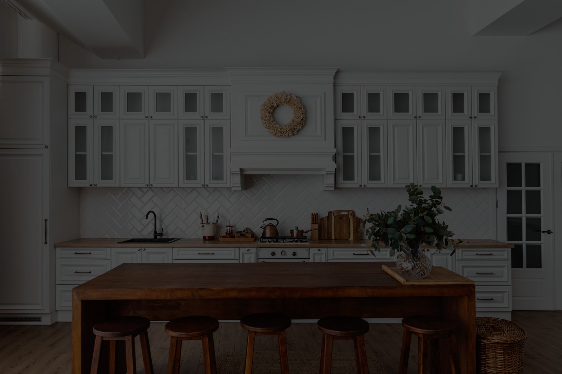 Kitchen design with warm wood island and tile backsplash, a popular 2026 style in Pennsylvania homes
